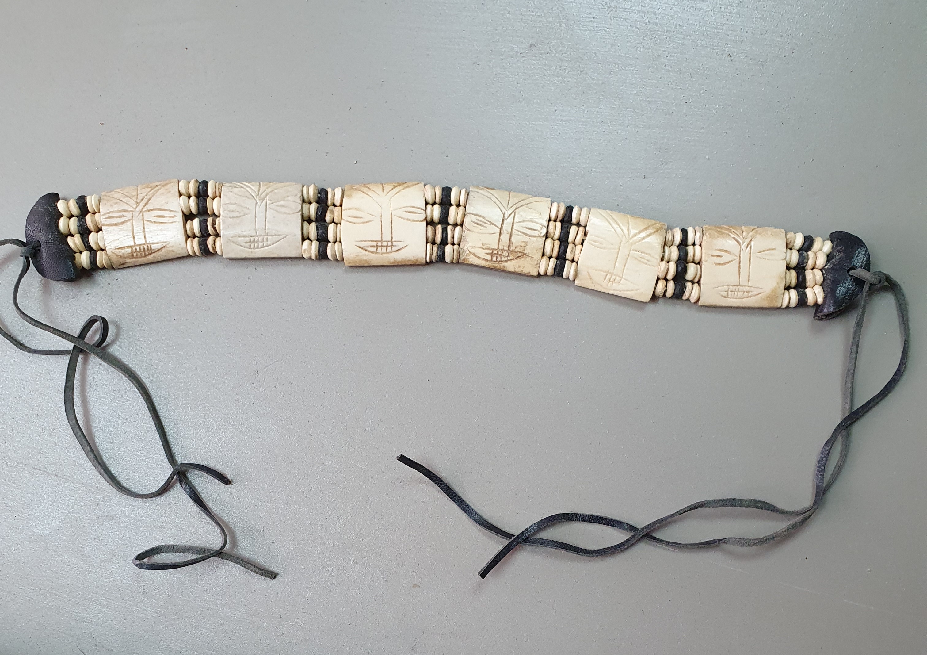 A belt made of bone cubes  